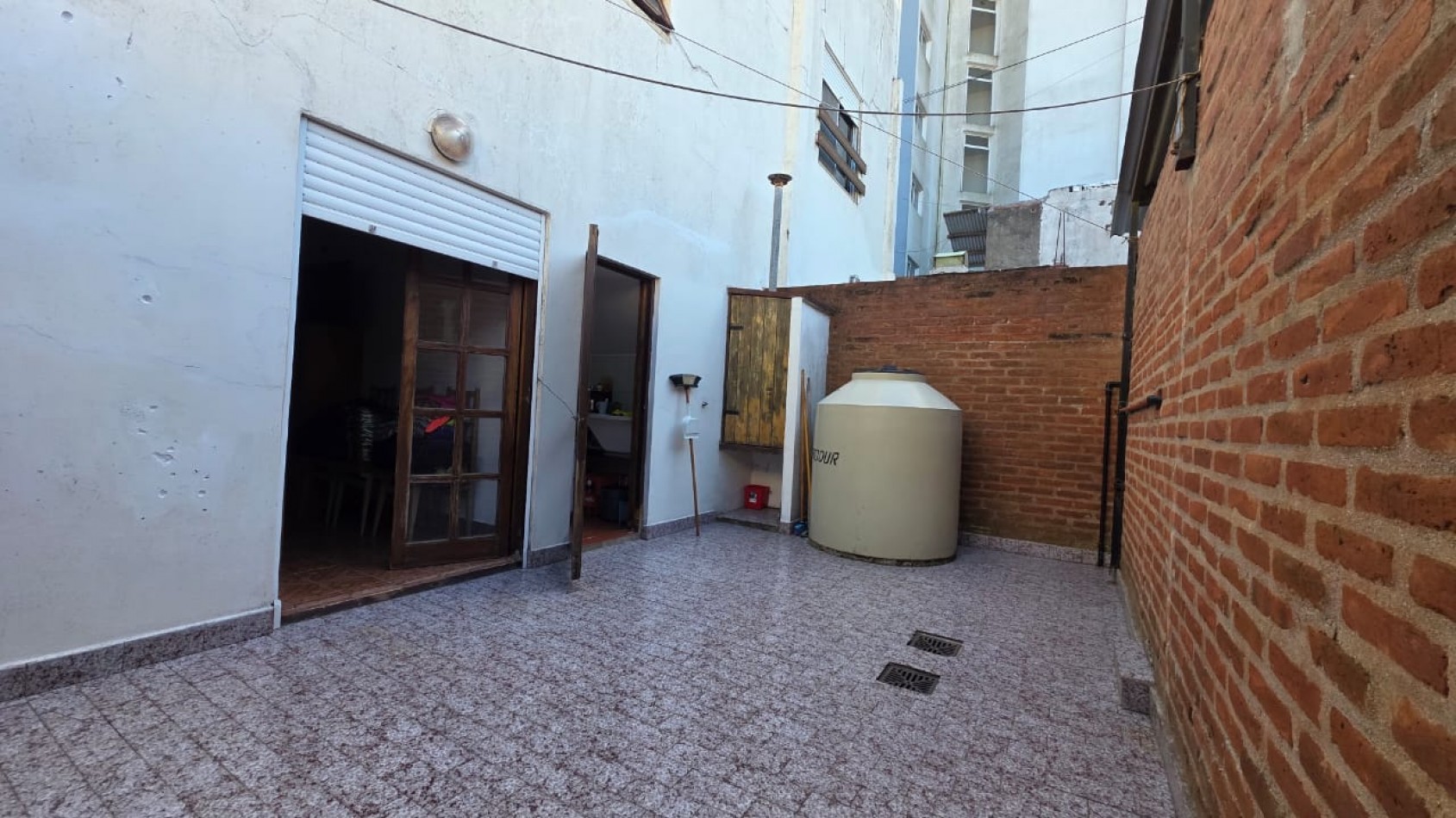 Complejo de 4 Departamentos sobre lote de 400mts - Pleno centro - Gran Oportunidad de inversion!!!